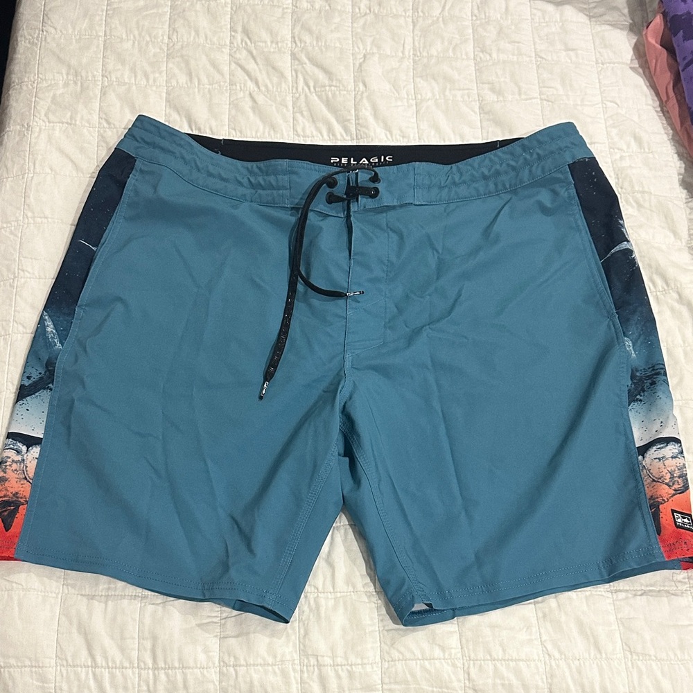 Pelagic Teal Blue Swim Board Shorts with Graphic Side Panels